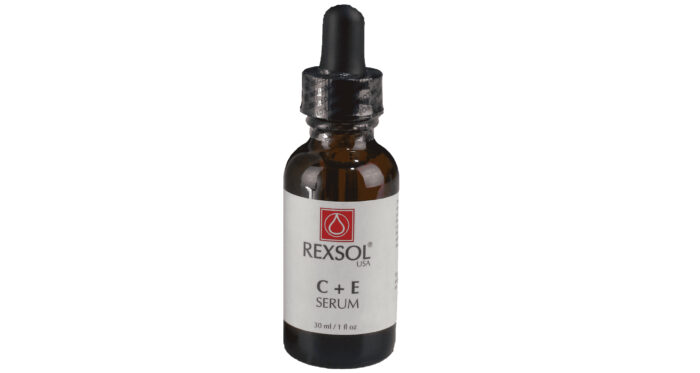 A bottle of Rexsol C+E Serum with dropper on a white background