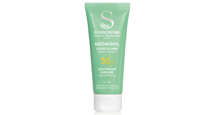 A tube of MEDACNYL Lightweight Suncare SPF50 with a white background